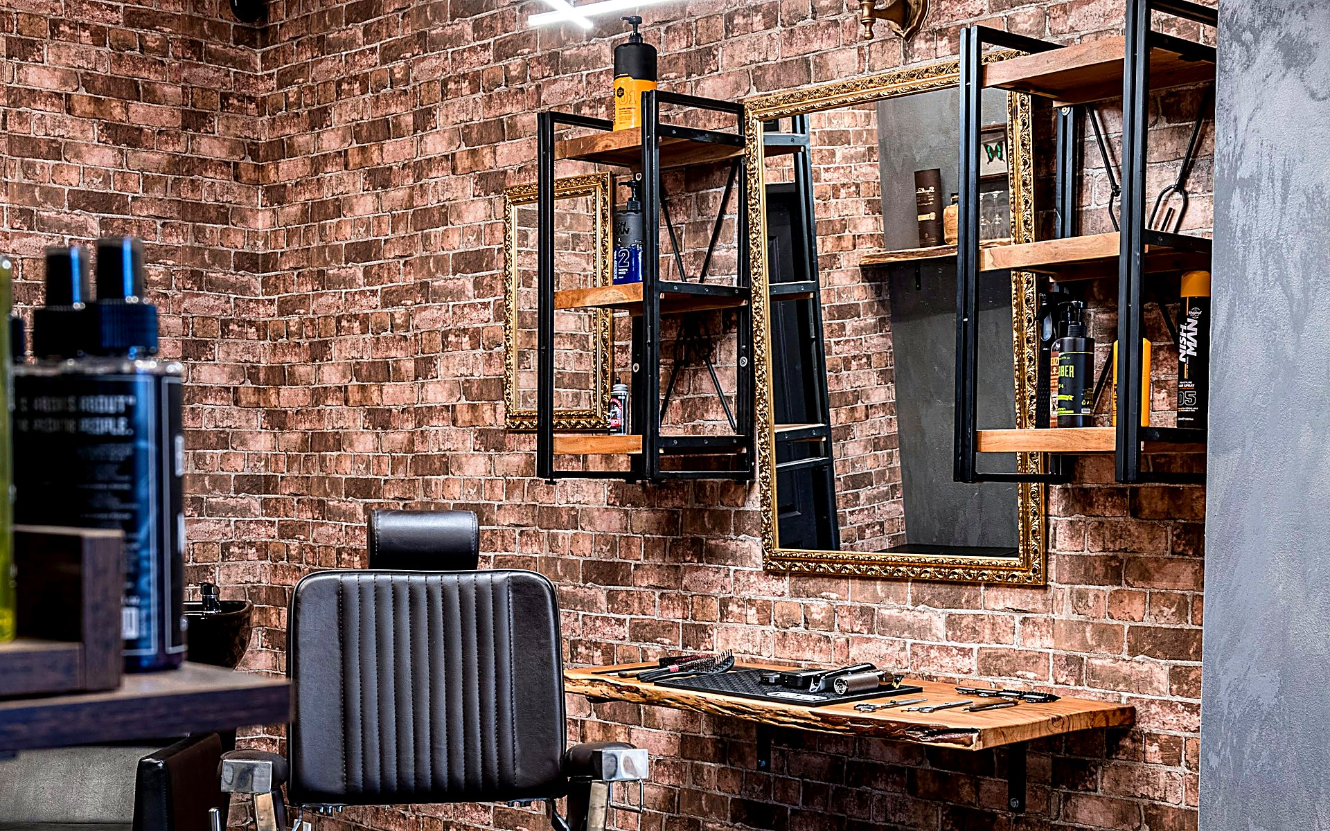 After: sharp, professionally lit barbershop photo